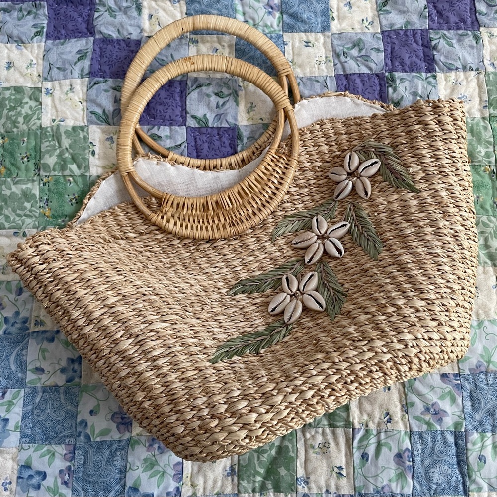 Straw tote bag with inside slip pocket.